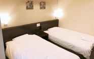 Kamar Tidur 4 Business Hotel SUNP