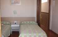 Kamar Tidur 2 Beatriz Charming Hostal