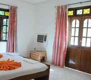 Bedroom 4 D'souza's Holiday Homes