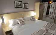 Kamar Tidur 4 The Royal George Hotel