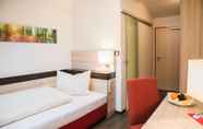 Kamar Tidur 4 TaunusTagungsHotel