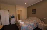 Kamar Tidur 2 Chadstone Executive Motel