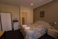 Kamar Tidur Chadstone Executive Motel