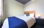 ห้องนอน 6 Central Resort Miyakojima