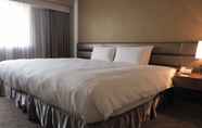 Phòng ngủ 4 Grand City Hotel