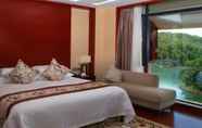 Kamar Tidur 3 New Century Resort & Spa Puer