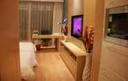 Kamar Tidur 4 Xingyi International Hotel Poly Store