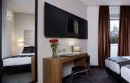 Kamar Tidur 4 Rome Art Hotel