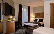 Kamar Tidur 5 Rome Art Hotel