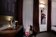 Kamar Tidur Rome Art Hotel