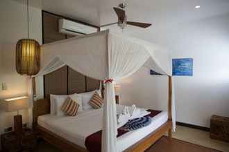 Kamar Tidur 4 Cadlao Resort & Restaurant