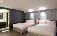 Bilik Tidur 4 Talmud Hotel Yizhong