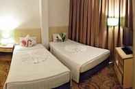 Kamar Tidur The Orchid Hotel