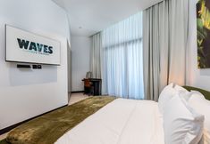 Others 7 Waves - Serene Waterfront Elegance: 2BR Haven in Business Bay