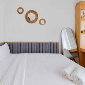 Primary image 1 Minimalist And Strategic Studio At Serpong Garden Apartment, Kost Putri Griyo Asri Setu Tangerang Selatan Hotels