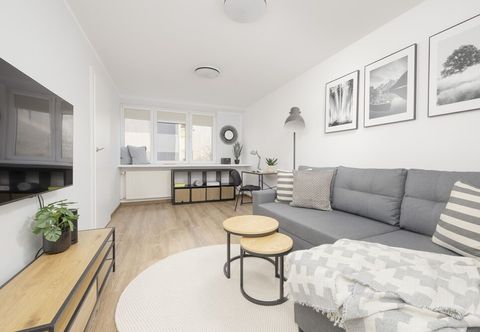 Others Grey Apartment Śródmieście by Renters