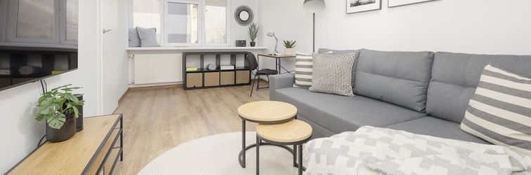 Others Grey Apartment Śródmieście by Renters