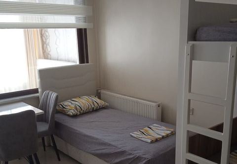 기타 ARMONİM ERKEK YURDU