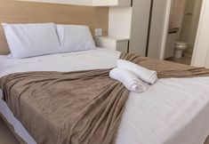 기타 5 Flats no Beach Class Residence por Yolo