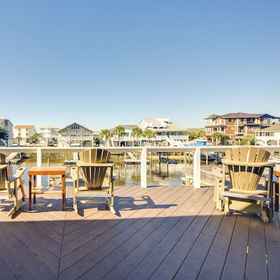 Primary image 1 Decks, Patio & Dock: Coastal Ocean Isle Beach Home, Hotel Oyster Bay Golf Links