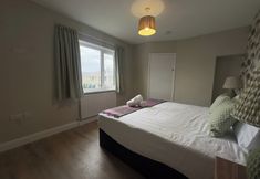 其他 3 House Sleeps 10-garden-parking-nearbarryisland