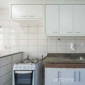 Private kitchen 1 Comfort and Sophistication Just Steps From Praia do Morro - DBH, Hotel Praia das Virtudes