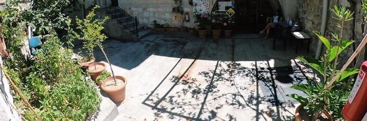 Others Whisper Cave House