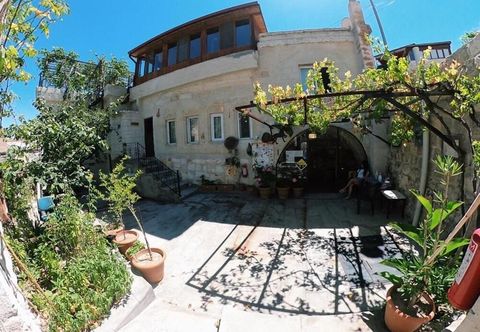 Others Whisper Cave House