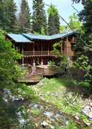 Imej utama Log Cabin on the Stream