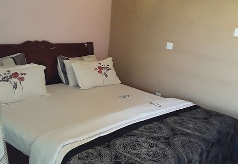 Khác Unik Hotel Limited