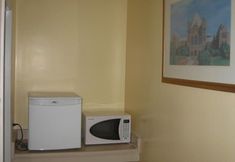 기타 6 Caravan Inn Motel