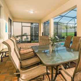 Primary image 1 เกรอห์อาร์เอฟดี1485 - แชมเปียนส์ เกท รีสอร์ท - บ้านพัก 5 ห้องนอน 4 ห้องน้ำ, โรงแรม & ที่พัก Calabay Palms Villa