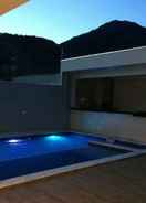 Imej utama Casa com piscina em Caraguatatuba