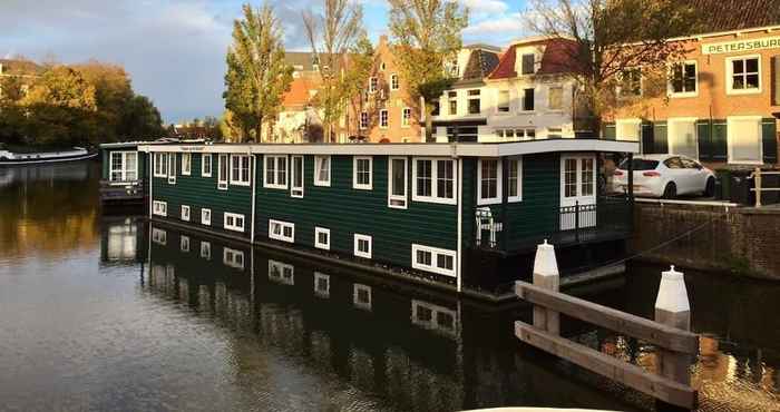 Others Slapen in eigentijds woonboot hotel