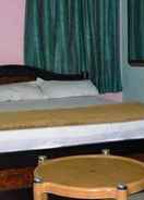 Primary image Iroomz HotelTanmai Residency