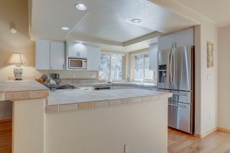 Others 4 Pet-Friendly 13 Ollalie Home features Double Car Garage by RedAwning