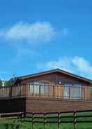 ภาพหลัก Woodpecker Lodge With Hot Tub Near Cupar, Fife