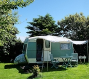 Others 2 Kitty Unique 60s Caravan set in Pretty Garden