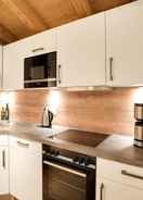 Dapur peribadi Luxurious Mountain View Holiday Home With Sauna in Krimml