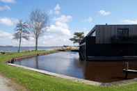 Lainnya Charming Apartment in Langweer With Jetty