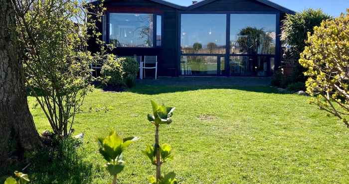 Others 6 Pers House Marijke With Winter Garden and Direct Access to the Lauwersmeer