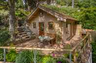 Khác Porthole Log Cabin