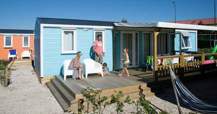 Others Colorful Chalet With Terrace Almost at the Lake and Beach