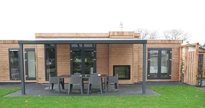 Others Modern Chalet With a Decorative Fireplace Near the Veluwe
