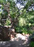 Imej utama Pure Wilderness in Amanzimlotzi Riverside Bush Tent in Limpopo, Kruger Park