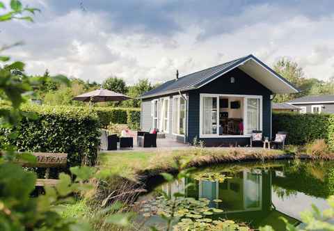 Others Enticing Chalet With a Dishwasher, Directly on a Pond