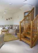 Living room Attractive Cottage in Garden Grounds