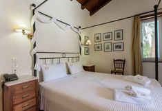 Others 2 Dine on the Generous Veranda at a Rustic Stone Getaway