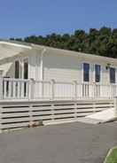 Primary image Impeccable 3-bed Lodge at Cayton Bay Holiday Park