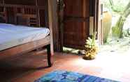 Others 4 Peaceful Homestay in the Middle of Fruit Garden - Room With Four Double Beds